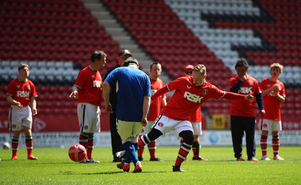 EITC and Upbeats playing football