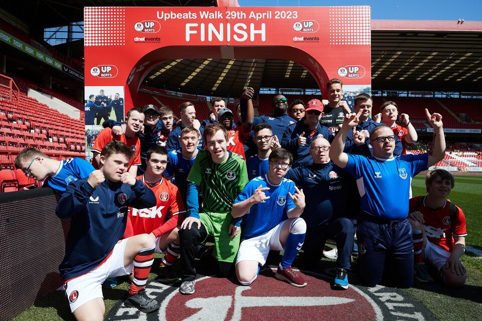 Everton team and the Upbeats together posed at finish line