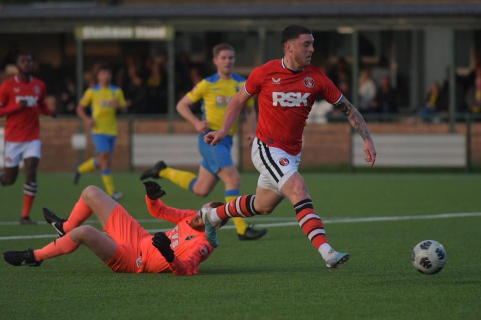 Dylan Gavin rounds the goalkeeper