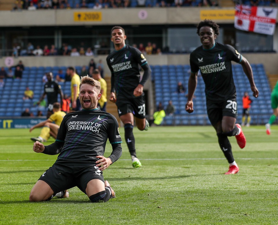 Alfie May celebrates