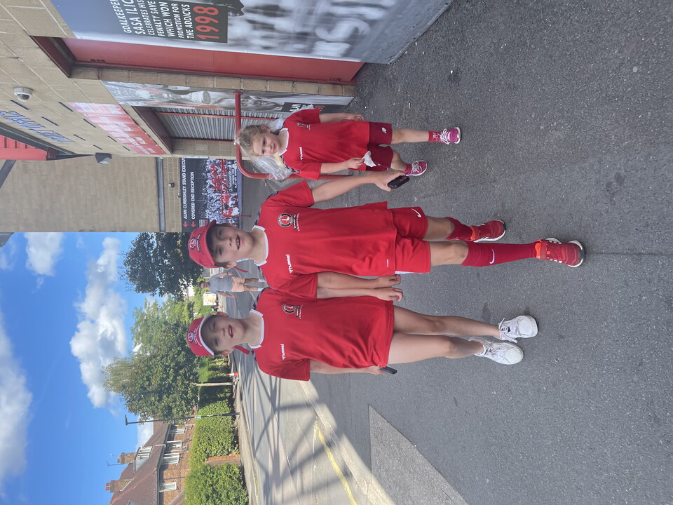 Young fans outside The Valley