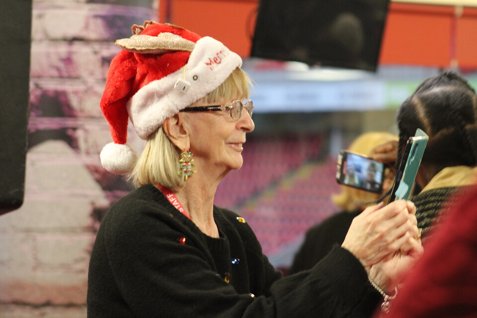 Extra Time member with a santa hat on