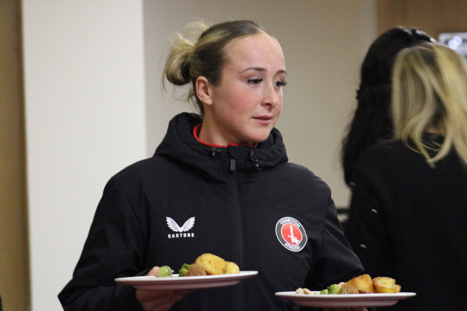 Taylor Bell serving Christmas dinner