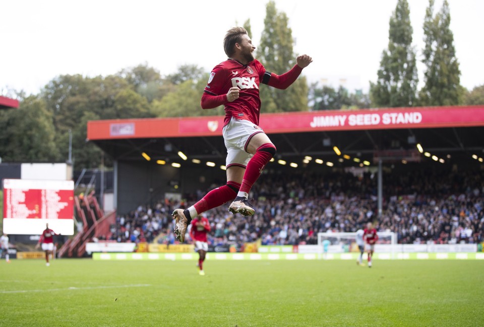 Alfie May celebrates