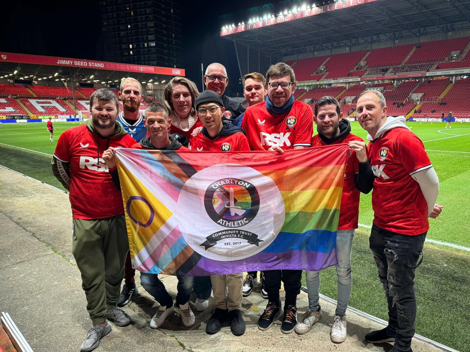 Charlton Invicta players with an Invicta flag pitchside at The Valley