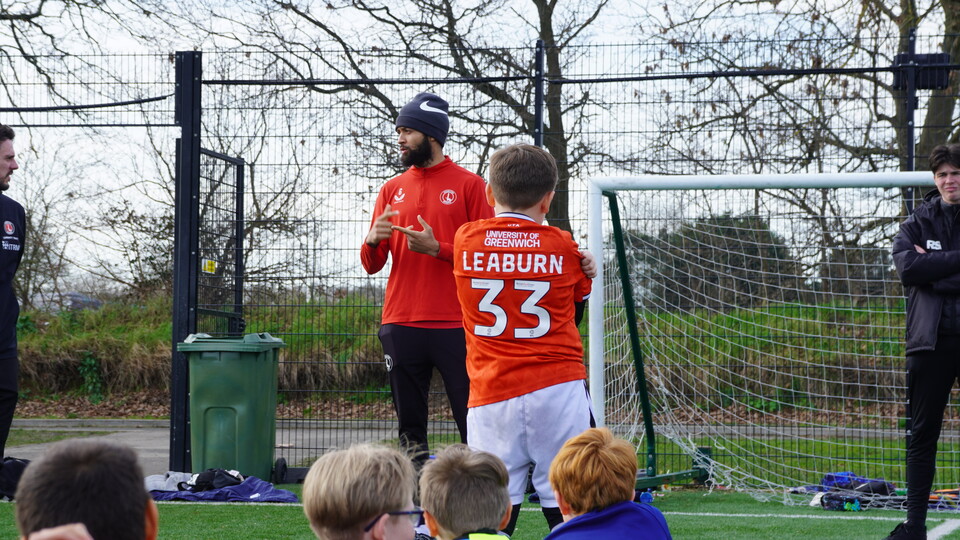 Michael Hector with young people from CACT's holiday course