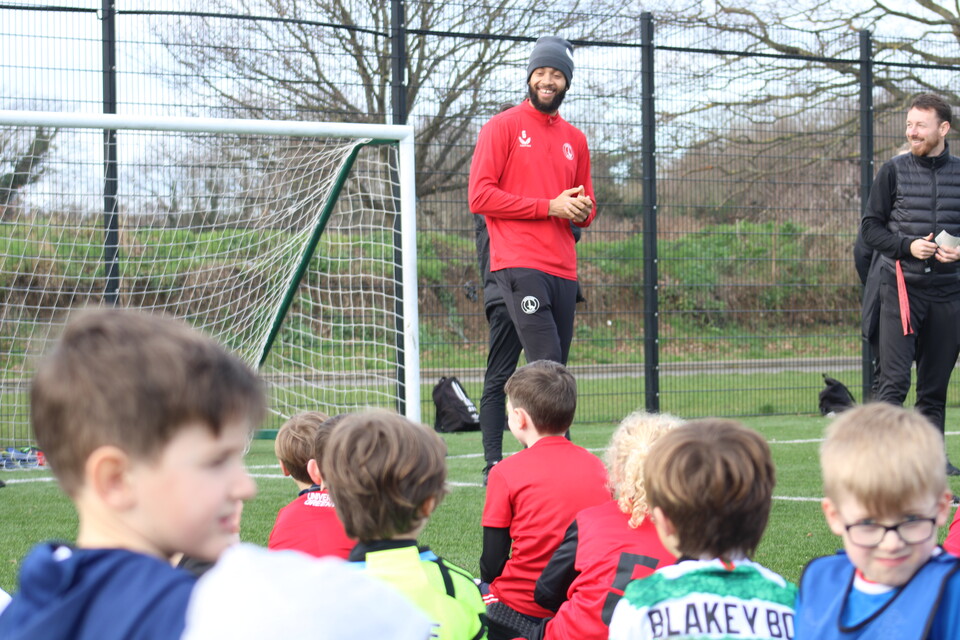 Michael Hector with young people from CACT's holiday course