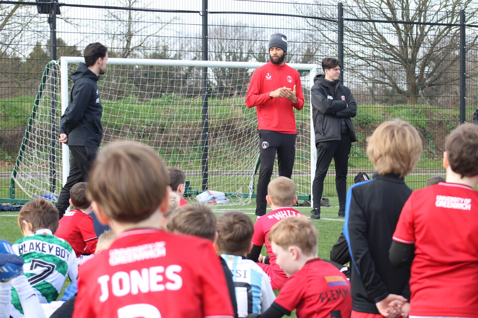 Michael Hector with young people from CACT's holiday course