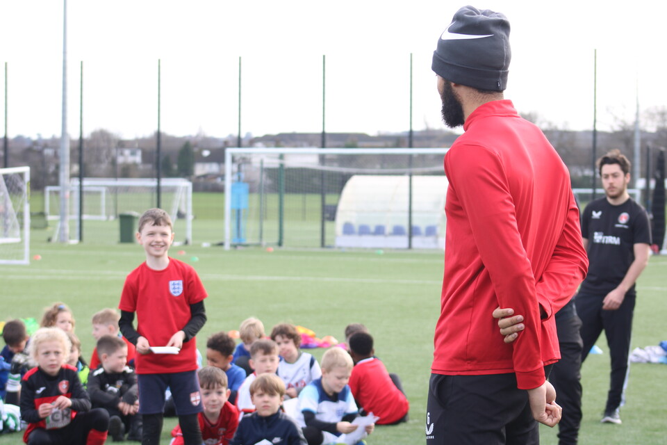 Michael Hector with young people from CACT's holiday course