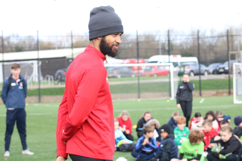 Michael Hector with young people from CACT's holiday course