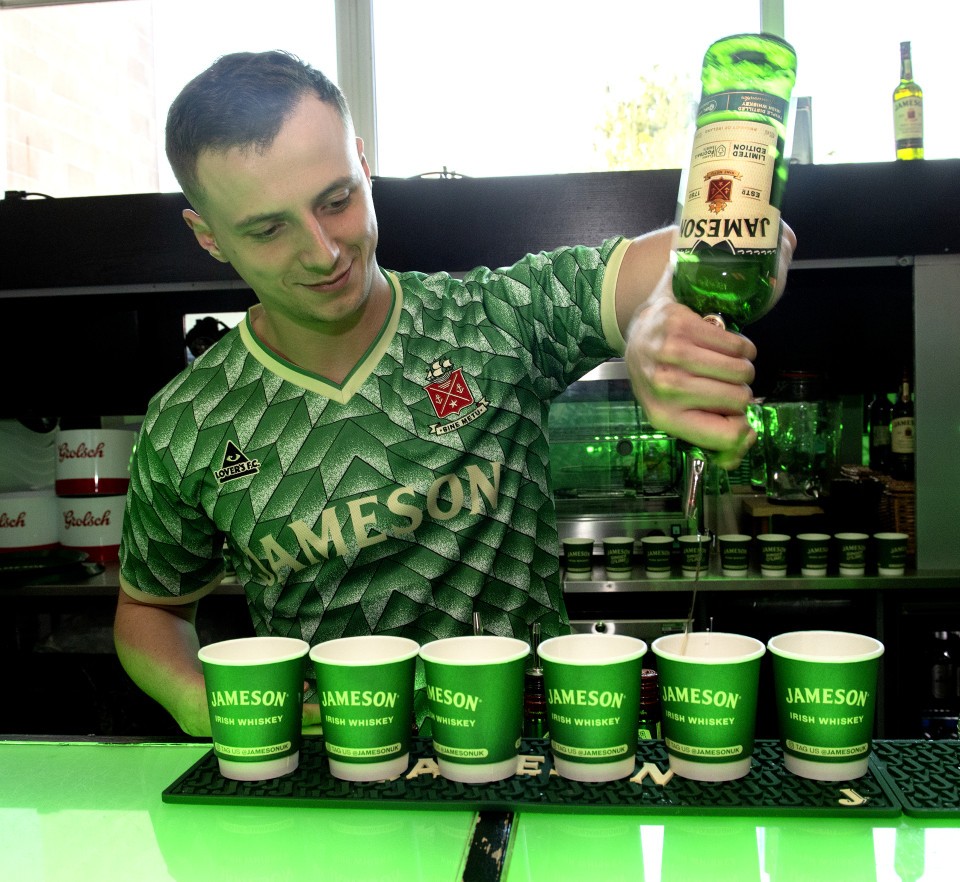 Bar staff serve Jameson drinks during a Charlton Legends Q&A in the Meantime Fans’ Bar at The Valley, London