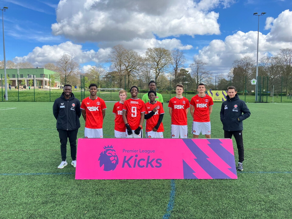 Premier League Kicks participants and staff with branding