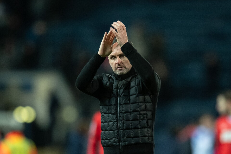Nathan Jones claps supporters