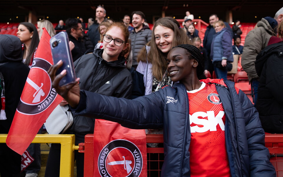 Fans and Karin Muya at Liverpool 