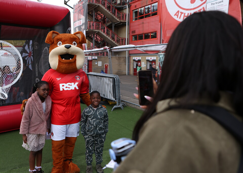 Mascot and fans in Fan Zone at Liverpool