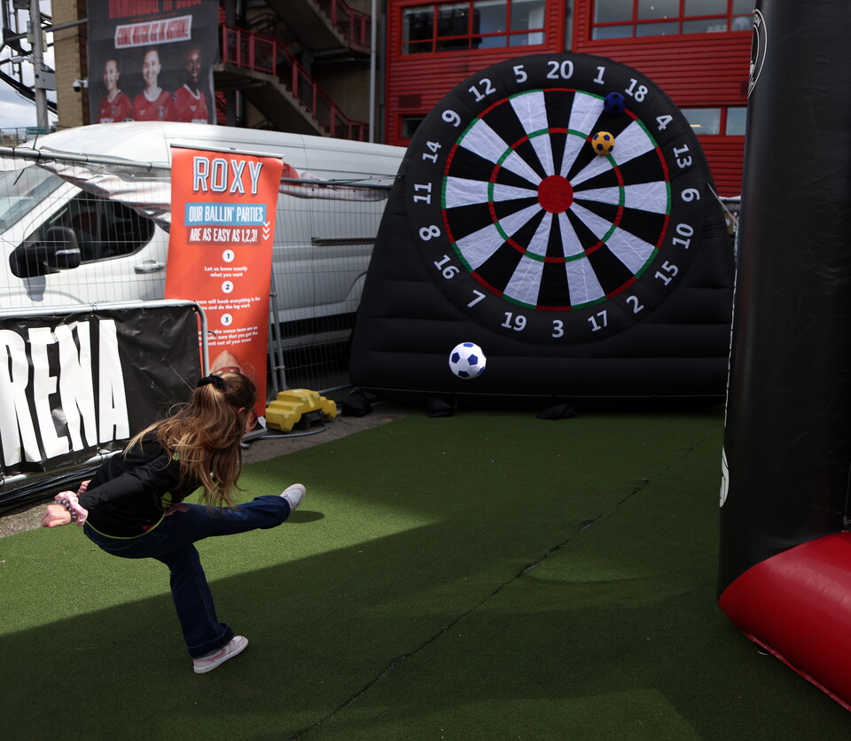 Fans playing games in Fan Zone