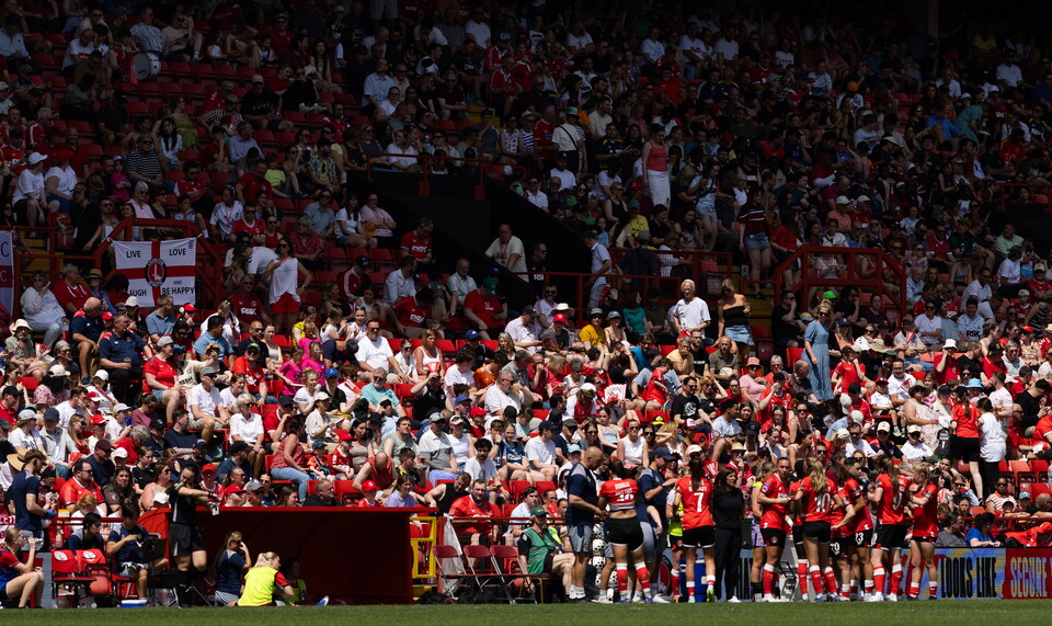 Fans and team as they wait for penalties