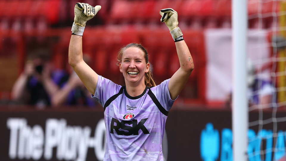 Sophie Whitehouse celebrates saving a penalty