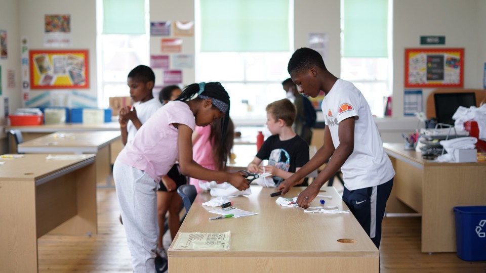 Group of young people doing arts and crafts