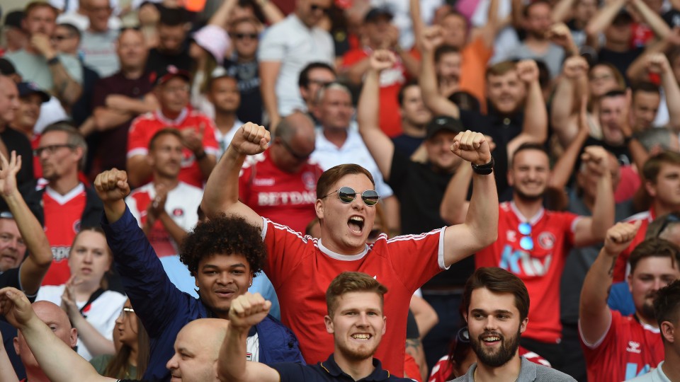 Charlton fans celebrate in the Covered End