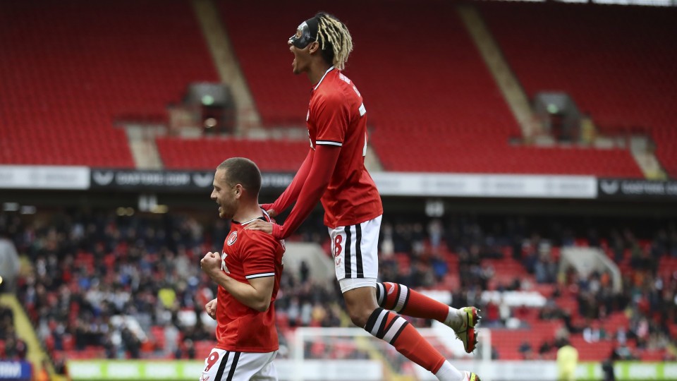 Sean Clare celebrates with Jack Payne