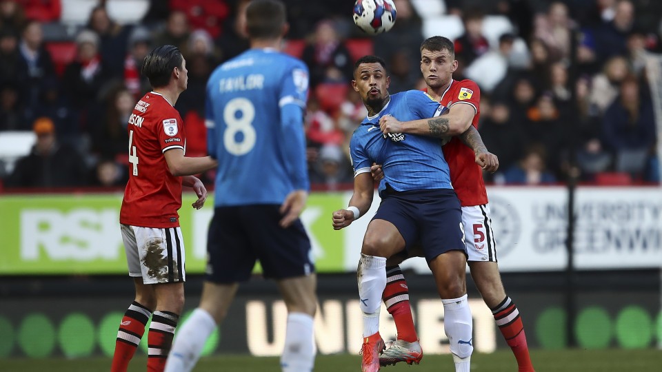 Lavelle battles for the ball