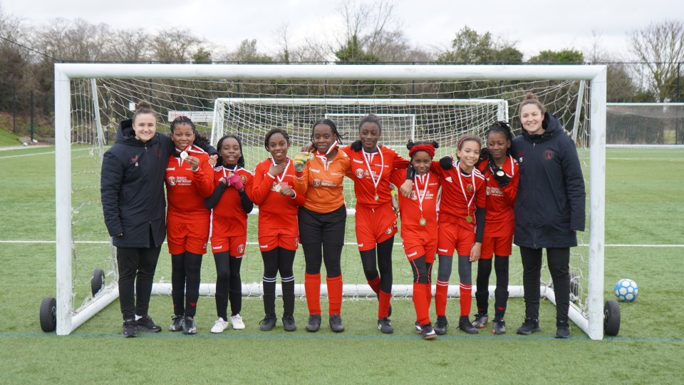 Lois Roche and Hannah Godfrey with the winning team