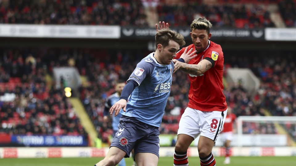 Macauley Bonne battles for the ball