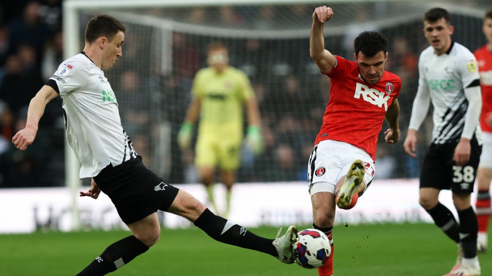 Scott Fraser strikes the ball against Derby County
