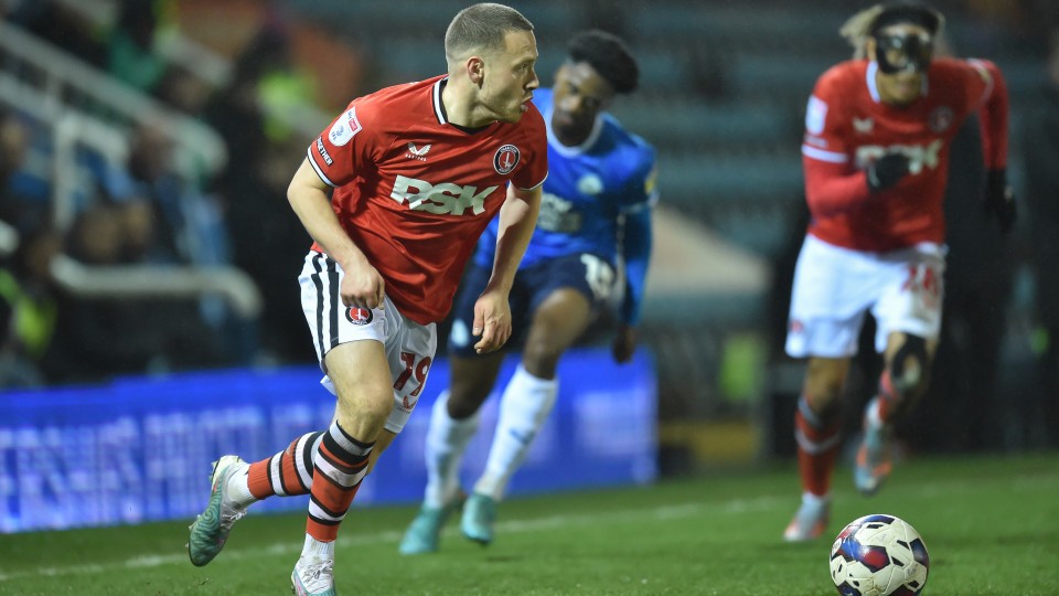 Payne moves forward with the ball