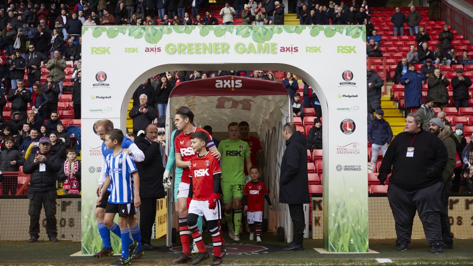 George Dobson leads the team out at the club's Greener Games