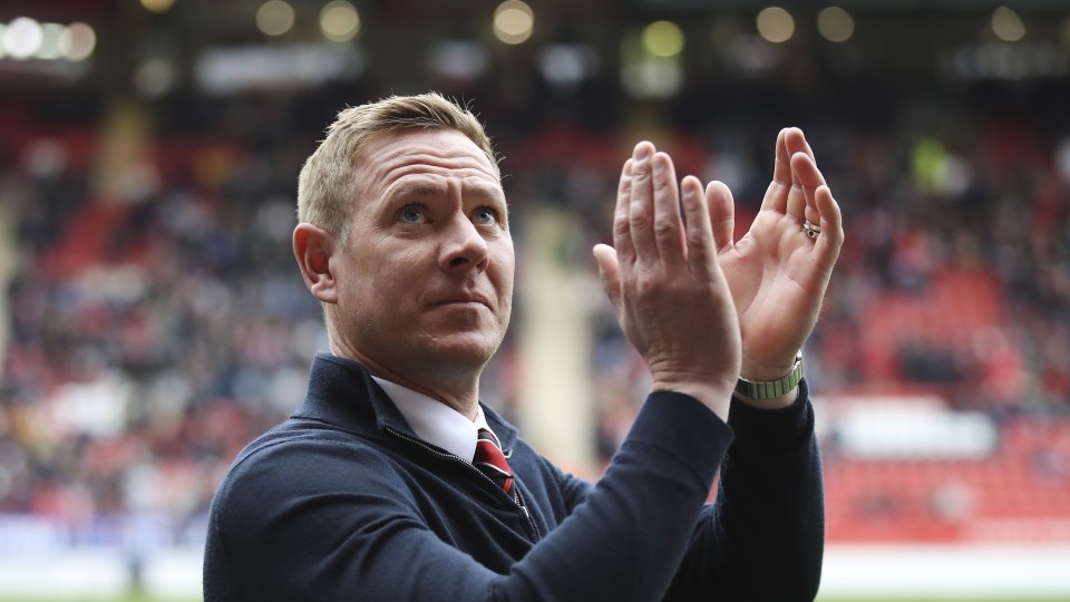 Holden claps supporters