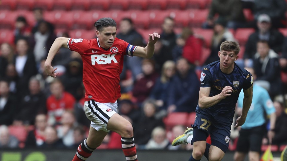 Dobson advances with the ball