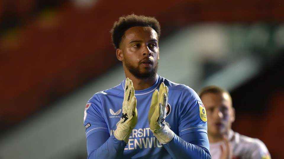 Joe Wollacott claps supporters