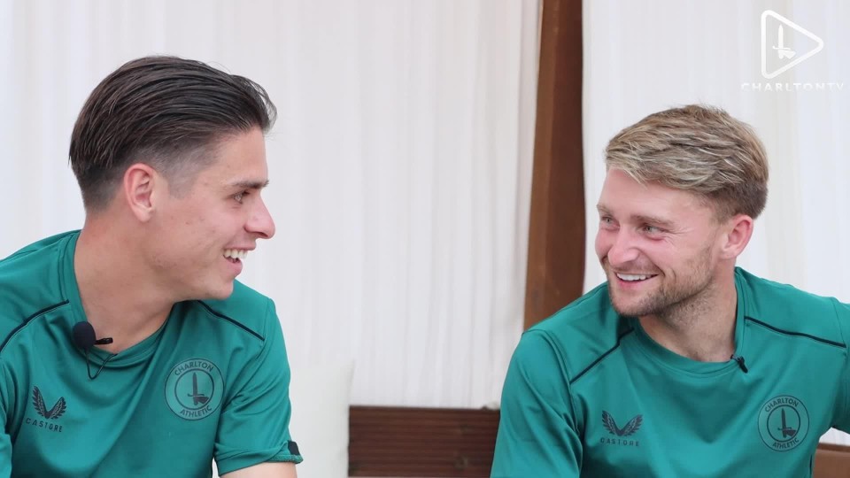 George Dobson and Alfie May looking at each other