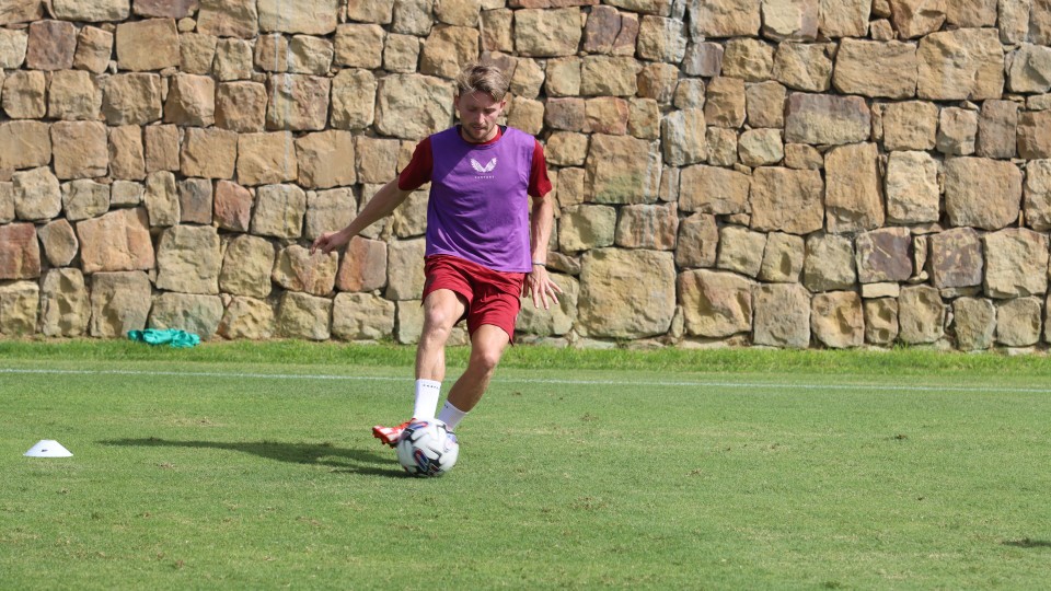 Alfie May passes the ball