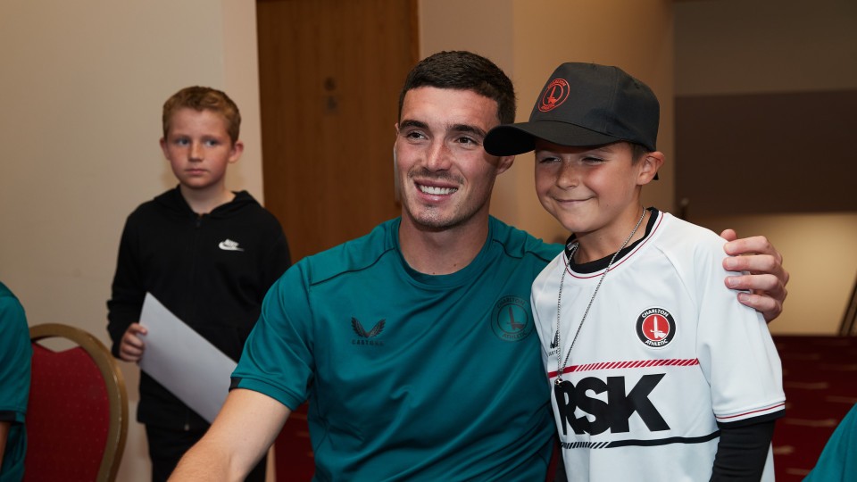 Lloyd Jones with a young fan
