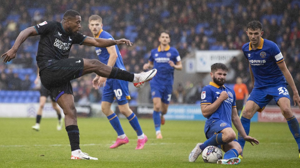 Chuks Aneke shoots at goal