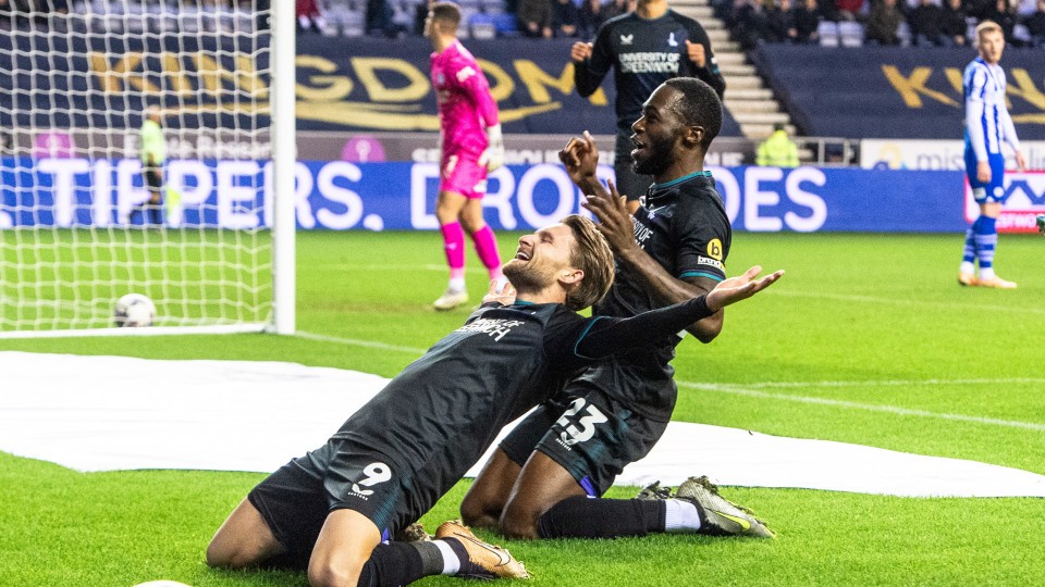 Alfie May celebrates