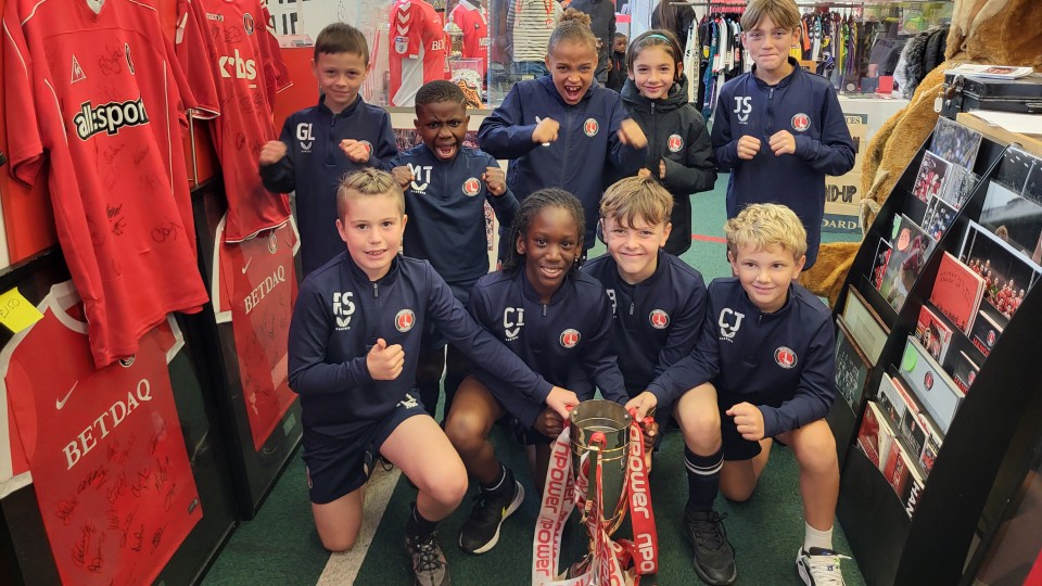 U9s celebrate with 2012 trophy