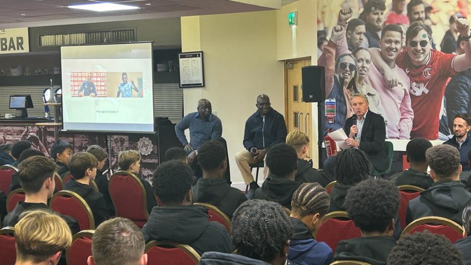 Augustus Gomez and Olu Elerewe speak at academy parents evening