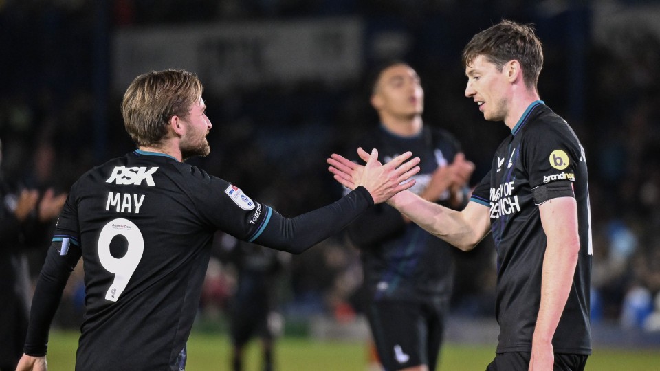 Conor McGrandles shakes hands with Alfie May