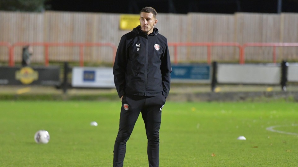 Jason Pearce watches on