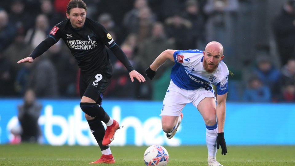 May and Williams battle for the ball