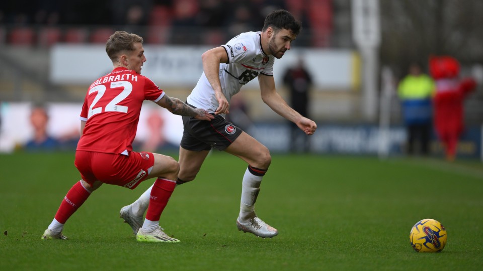 Scott Fraser battles for the ball