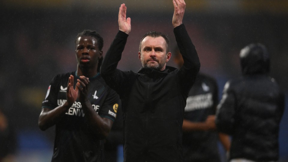 Nathan Jones claps supporters