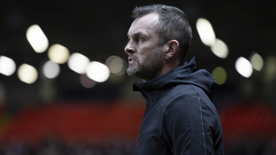 Nathan Jones watches on