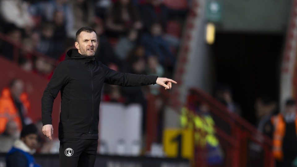 Nathan Jones watches on