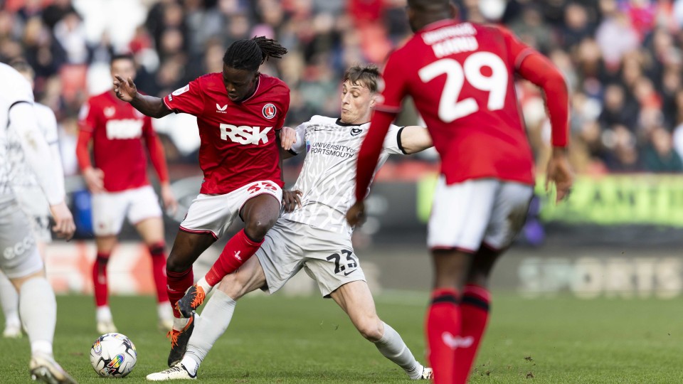 Karoy Anderson battles for the ball
