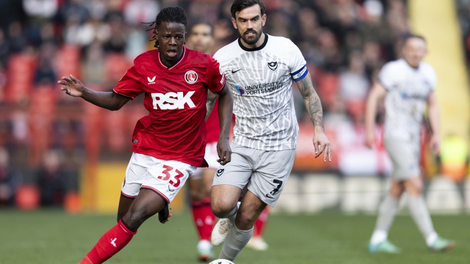 Karoy Anderson battles for the ball